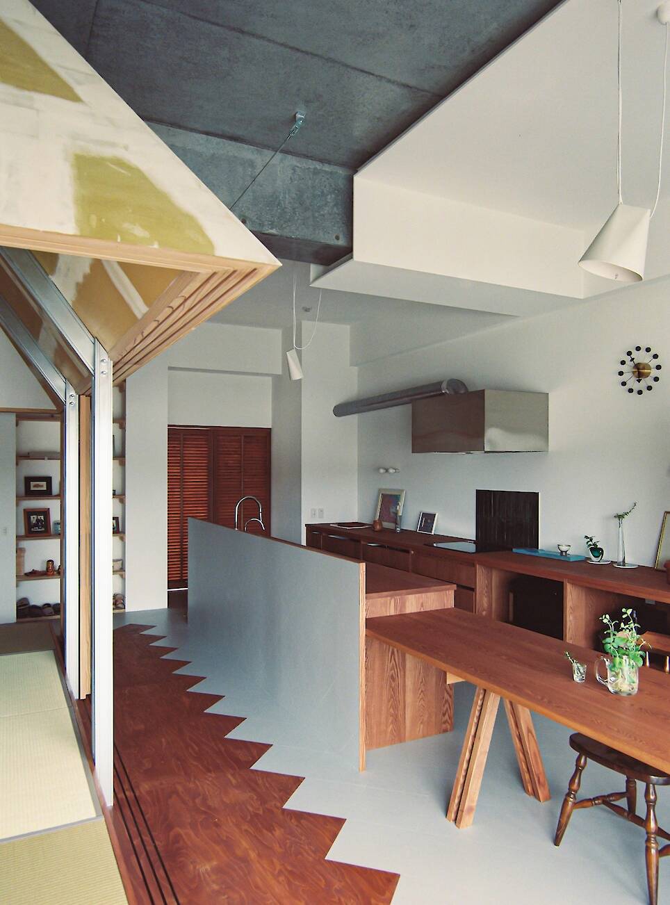 The wooden flooring features a zig-zagging edge