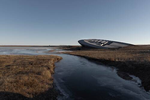 Büro Ziyu Zhuang creates UFO-shaped gallery in grassland in Inner Mongolia