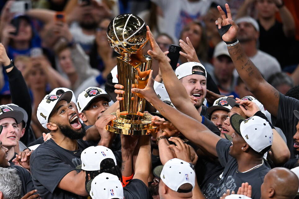 Photos show celebrations after the New York Knicks win first NBA championship since 1973