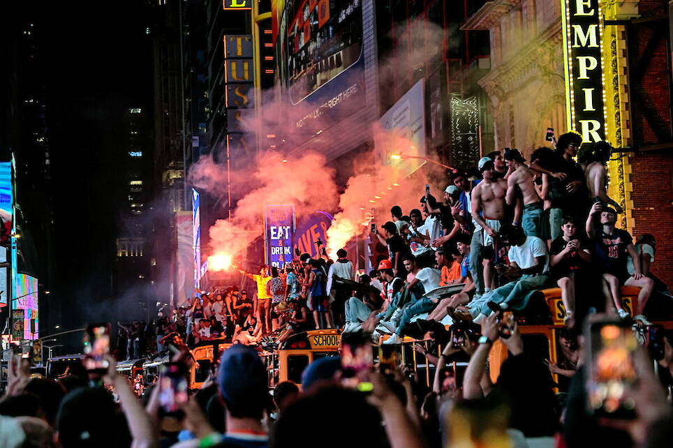 Photos show celebrations after the New York Knicks win first NBA championship since 1973