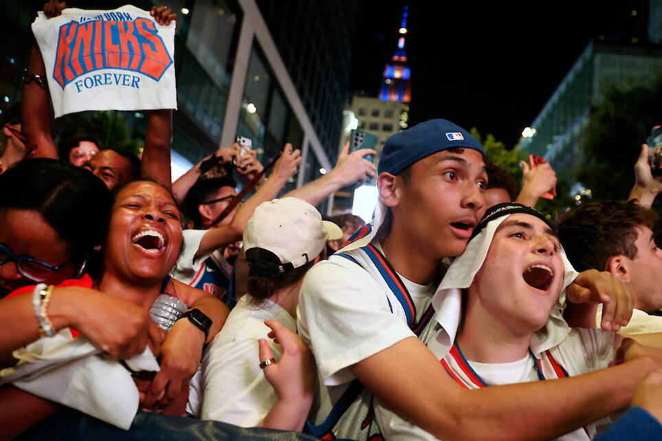 Photos show celebrations after the New York Knicks win first NBA championship since 1973