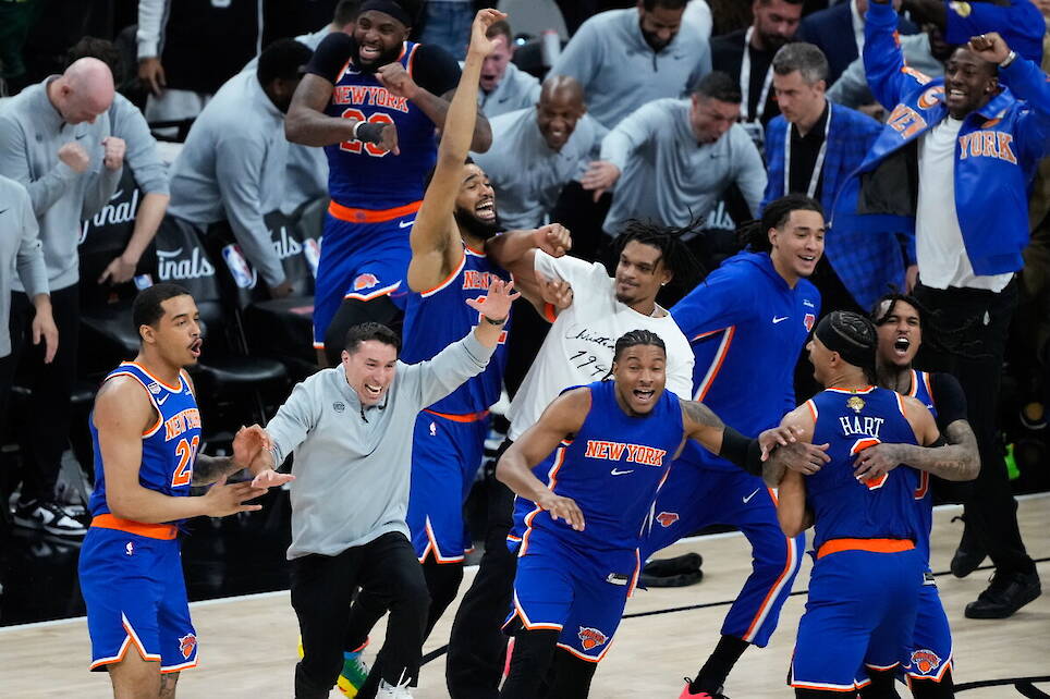 Photos show celebrations after the New York Knicks win first NBA championship since 1973