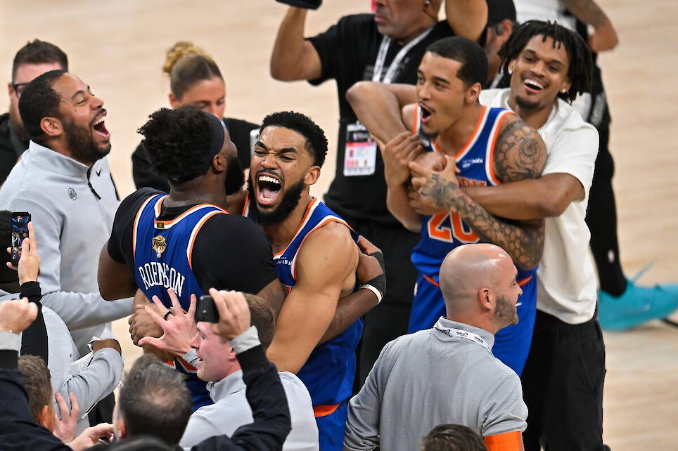 Photos show celebrations after the New York Knicks win first NBA championship since 1973