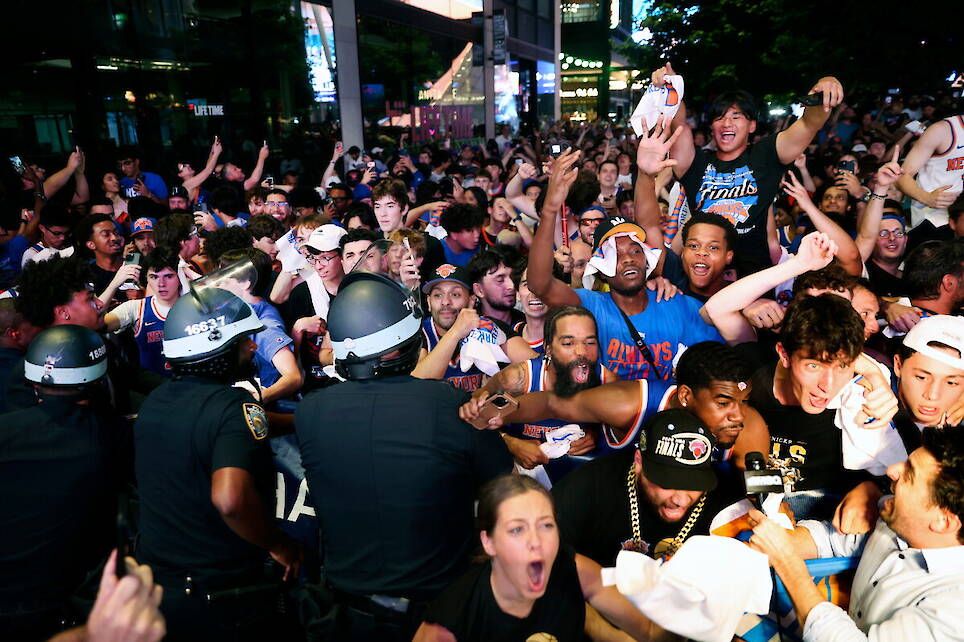 Photos show celebrations after the New York Knicks win first NBA championship since 1973