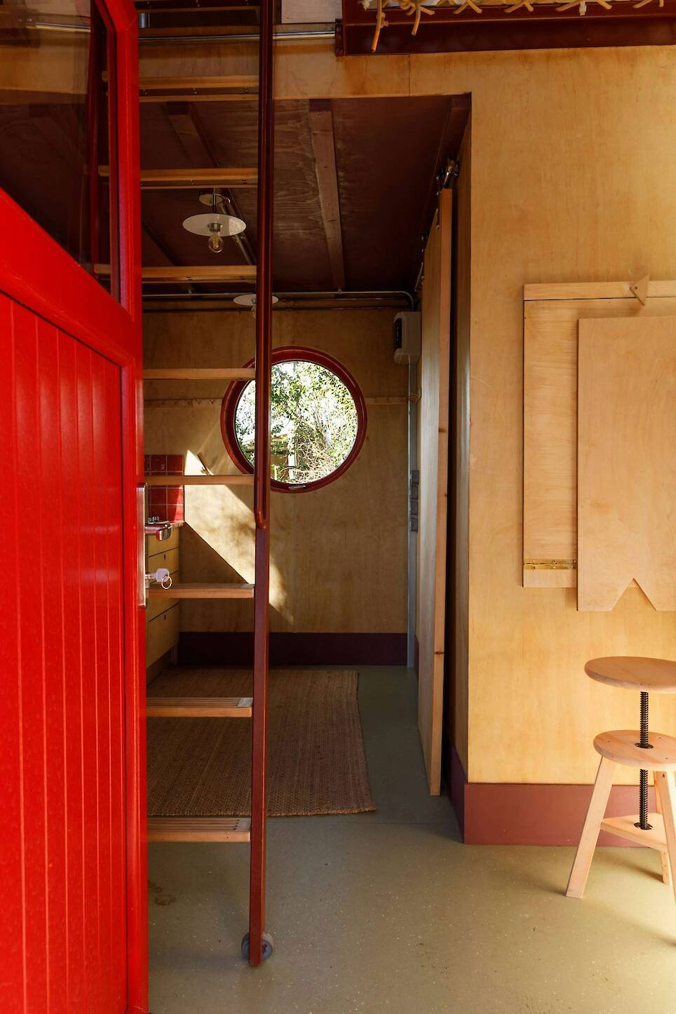 This Tiny Red Cabin Has a Lockbox for Your Phone