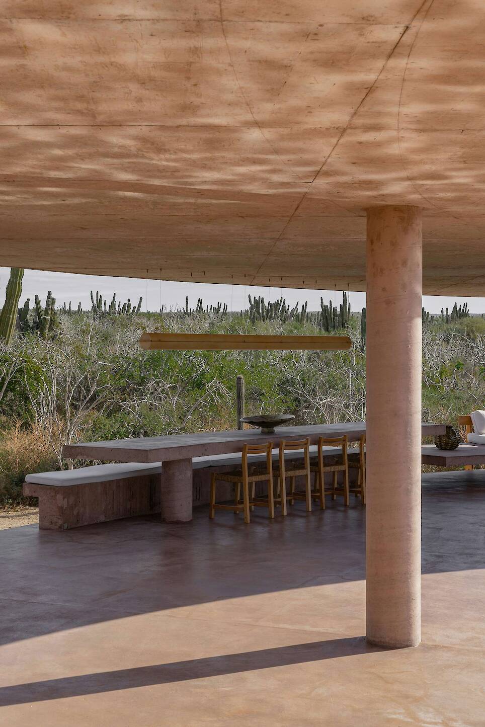 Lounging Is Mandatory at This Curving Concrete Beach House in Baja