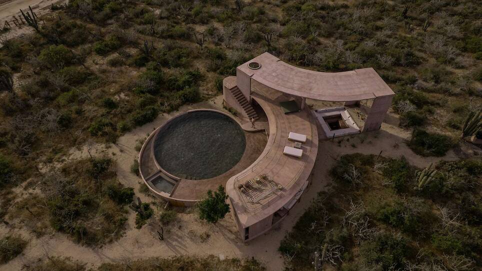Lounging Is Mandatory at This Curving Concrete Beach House in Baja