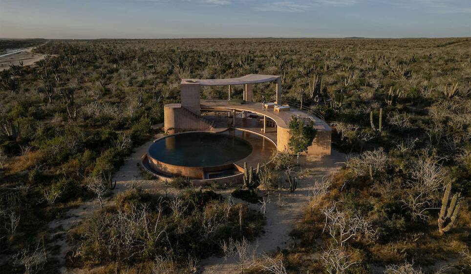 Lounging Is Mandatory at This Curving Concrete Beach House in Baja