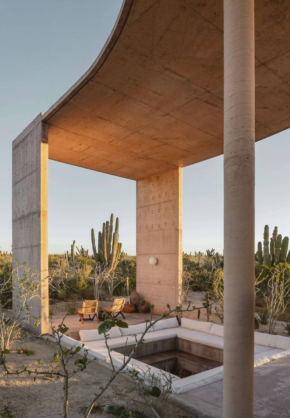 Lounging Is Mandatory at This Curving Concrete Beach House in Baja