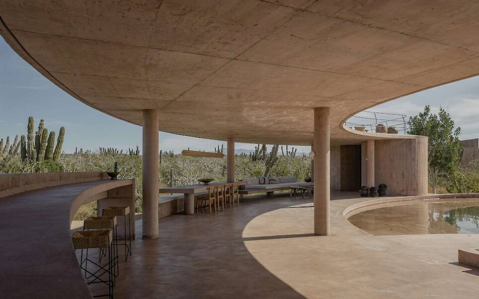 Lounging Is Mandatory at This Curving Concrete Beach House in Baja
