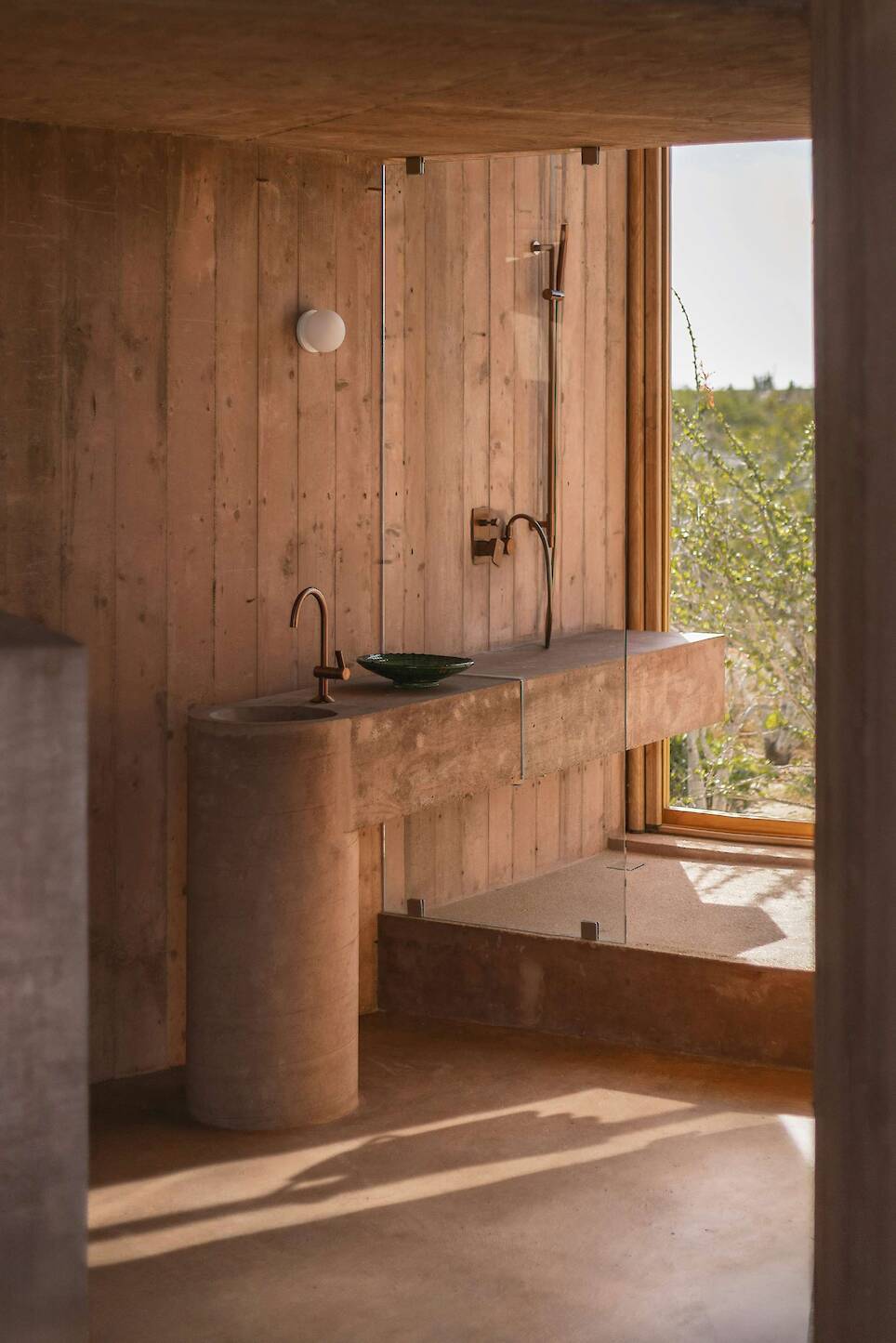 Lounging Is Mandatory at This Curving Concrete Beach House in Baja