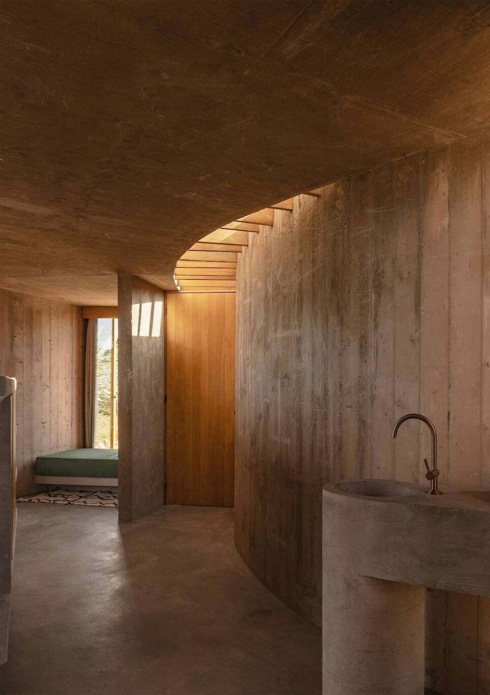 Lounging Is Mandatory at This Curving Concrete Beach House in Baja
