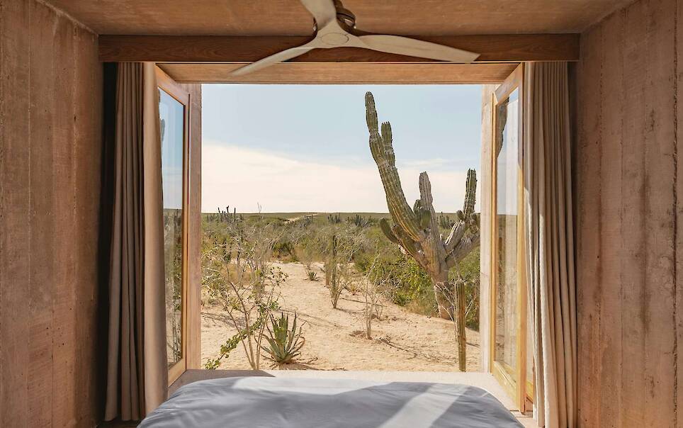 Lounging Is Mandatory at This Curving Concrete Beach House in Baja