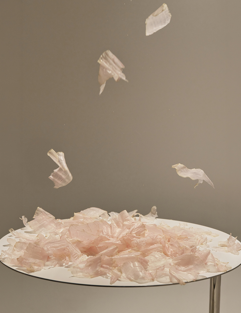 A kinetic installation shaped by shaved bonito flakes forms a continuous display system