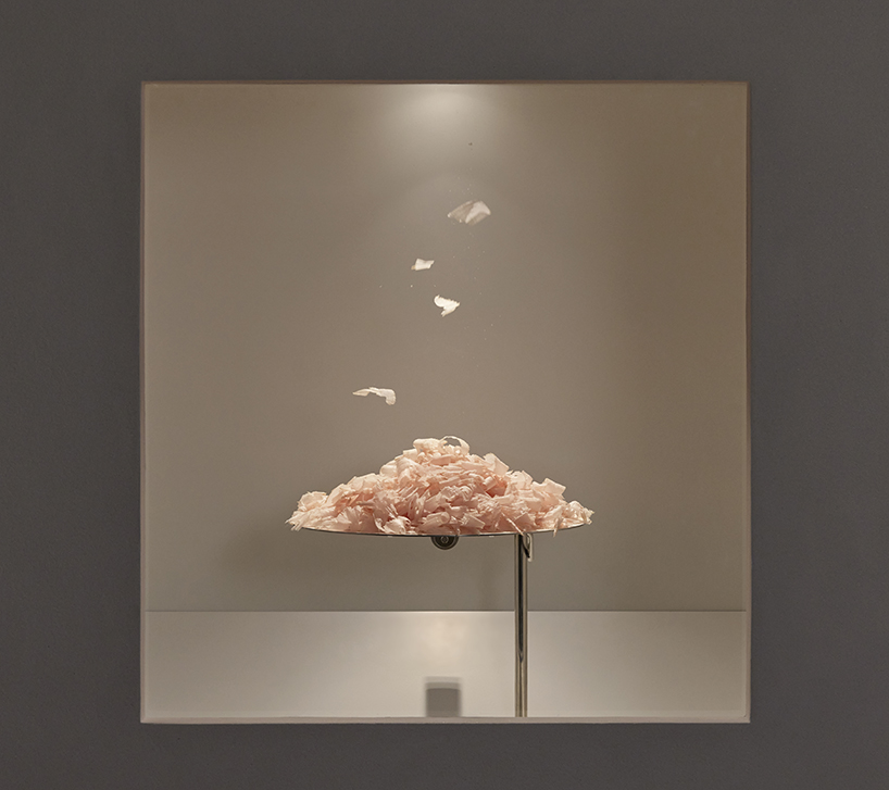 A kinetic installation shaped by shaved bonito flakes forms a continuous display system