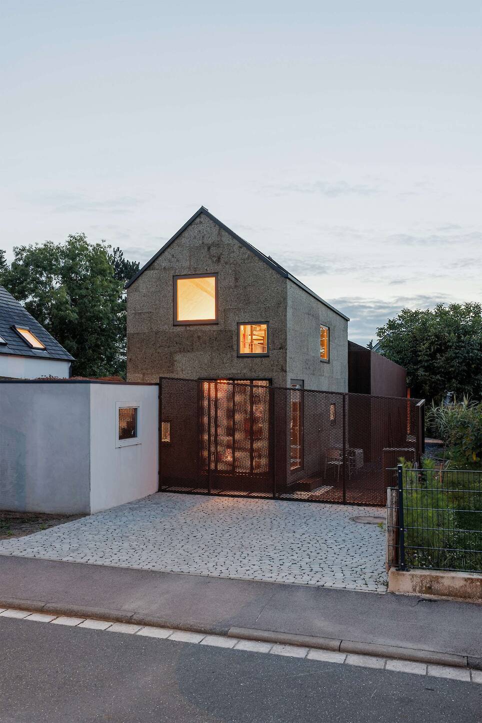 The Cork Facade Isn’t the Only Quirk of This Home Extension in Germany