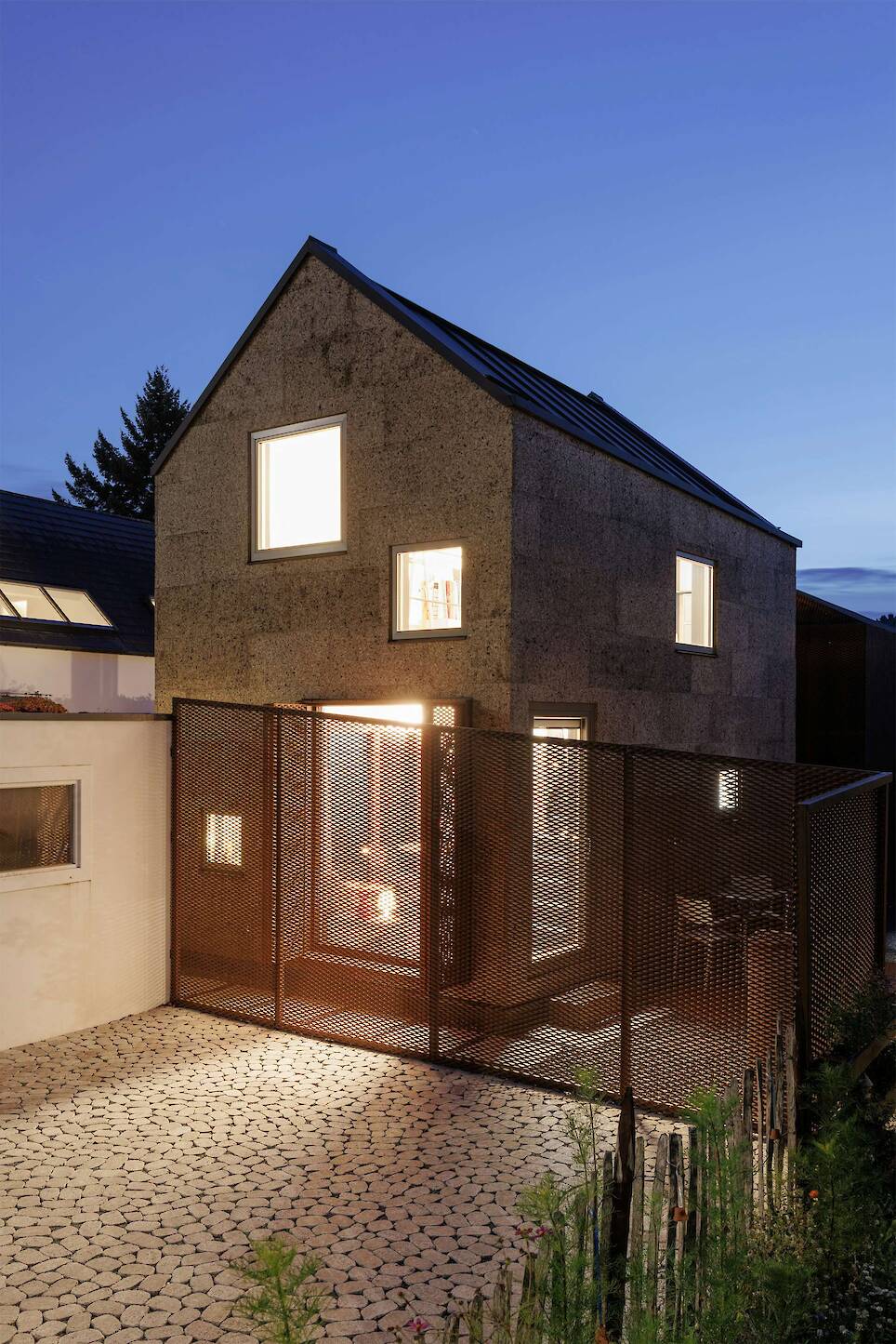 The Cork Facade Isn’t the Only Quirk of This Home Extension in Germany