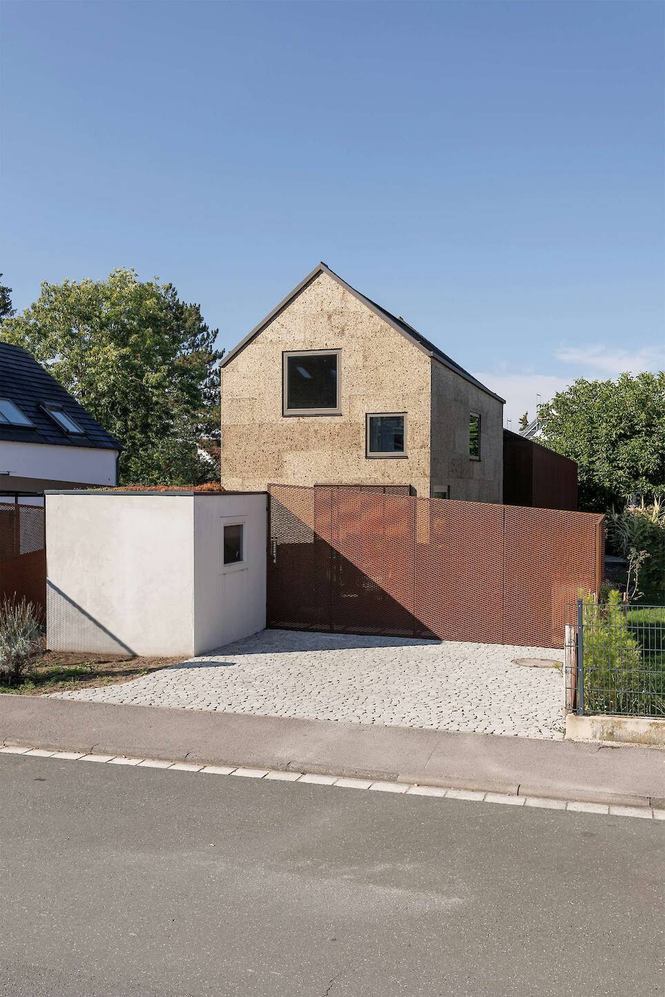 The Cork Facade Isn’t the Only Quirk of This Home Extension in Germany