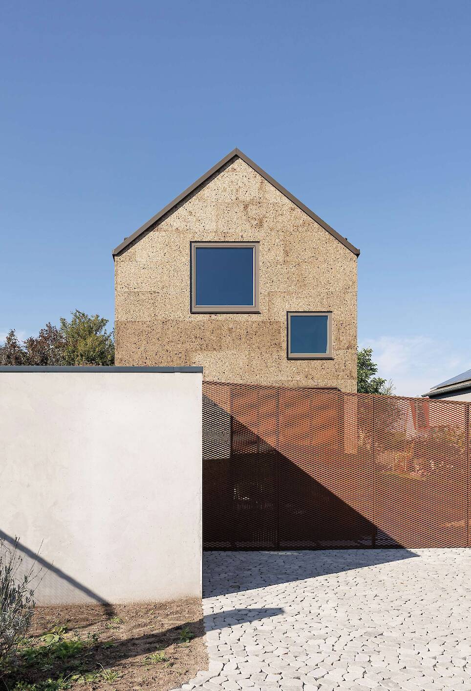 The Cork Facade Isn’t the Only Quirk of This Home Extension in Germany
