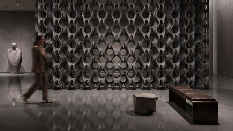 Robotic carving transforms reclaimed stone waste into porous modular system