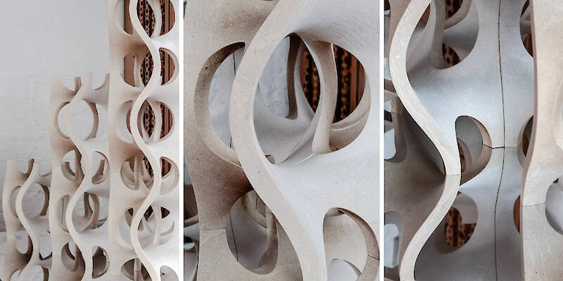 Robotic carving transforms reclaimed stone waste into porous modular system
