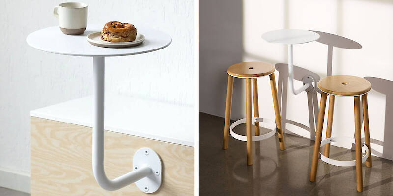 An aluminum café table that lifts away from the wall redefines flexible hospitality furniture