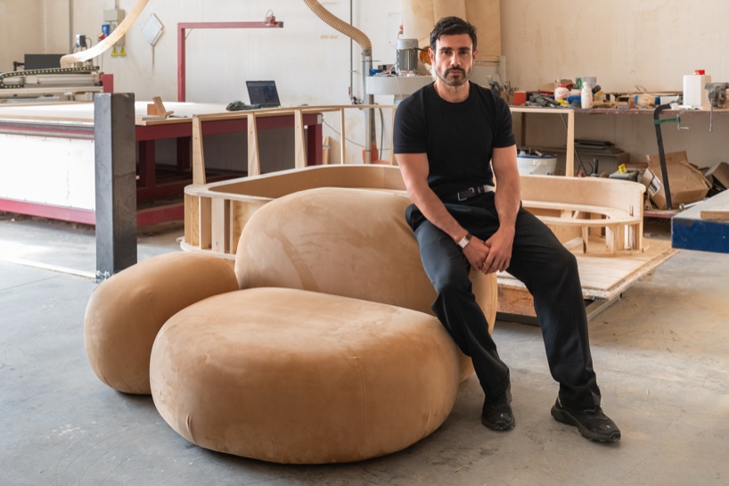 Soft monolithic forms shape a modular furniture collection in nubuck, alpaca, and oak