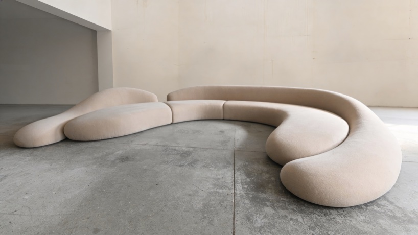 Soft monolithic forms shape a modular furniture collection in nubuck, alpaca, and oak