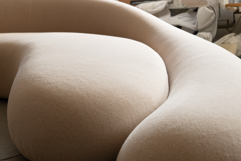 Soft monolithic forms shape a modular furniture collection in nubuck, alpaca, and oak