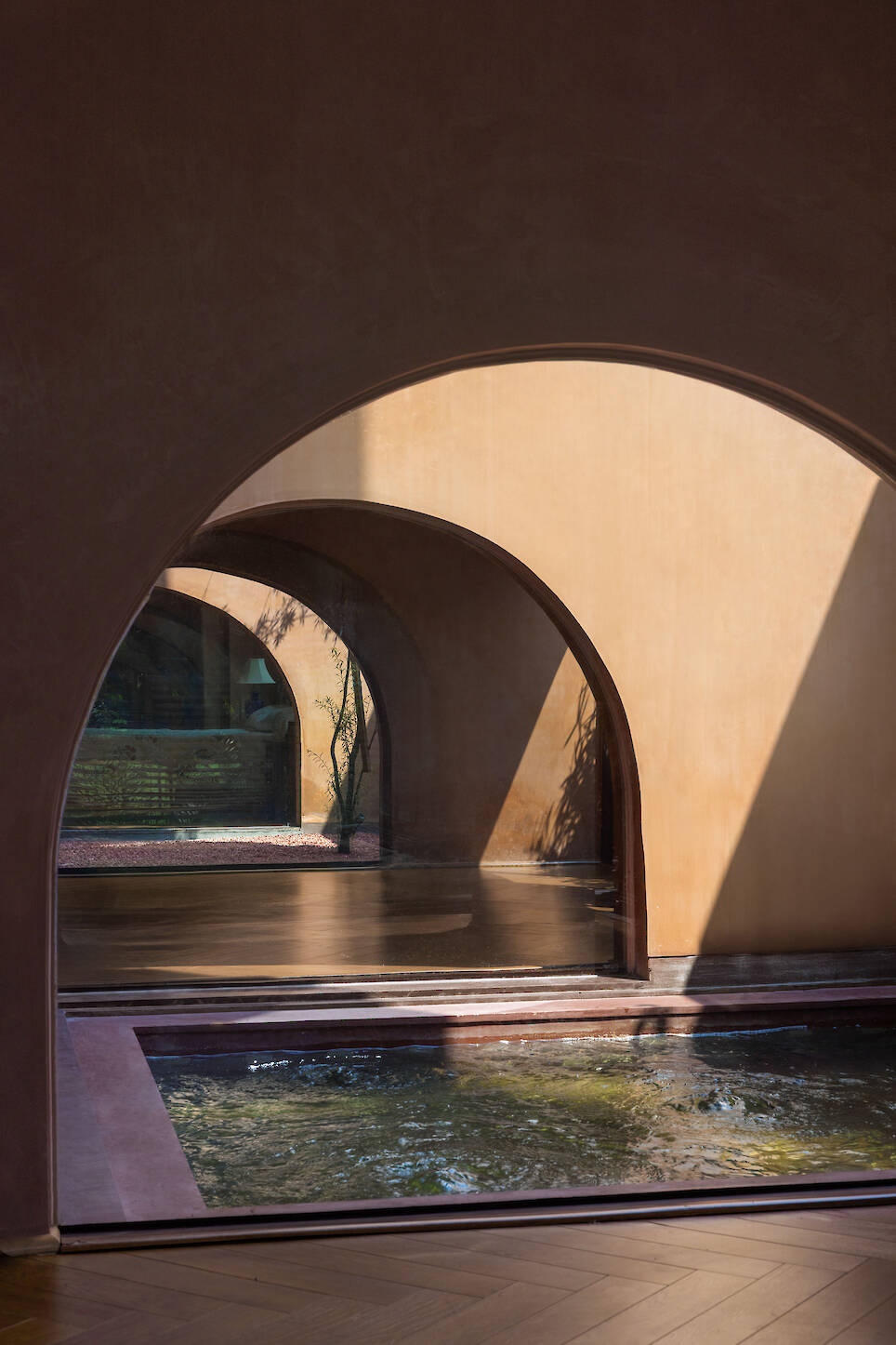 A Tale of Tinted Courts Residence / Architects Collaborative