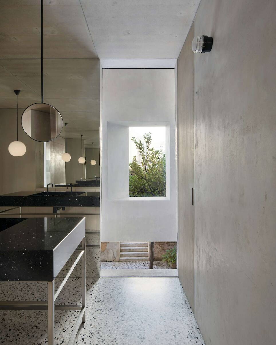 Burnished Aluminum Sheeting Covers the Entire Ground Floor of This Renovated 1893 Lisbon Home