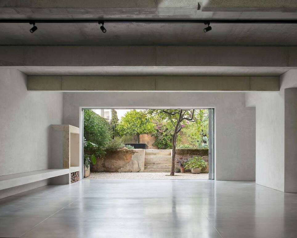 Burnished Aluminum Sheeting Covers the Entire Ground Floor of This Renovated 1893 Lisbon Home