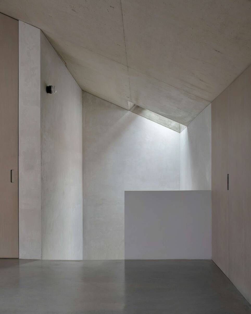 Burnished Aluminum Sheeting Covers the Entire Ground Floor of This Renovated 1893 Lisbon Home