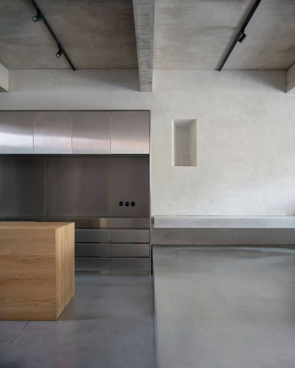 Burnished Aluminum Sheeting Covers the Entire Ground Floor of This Renovated 1893 Lisbon Home