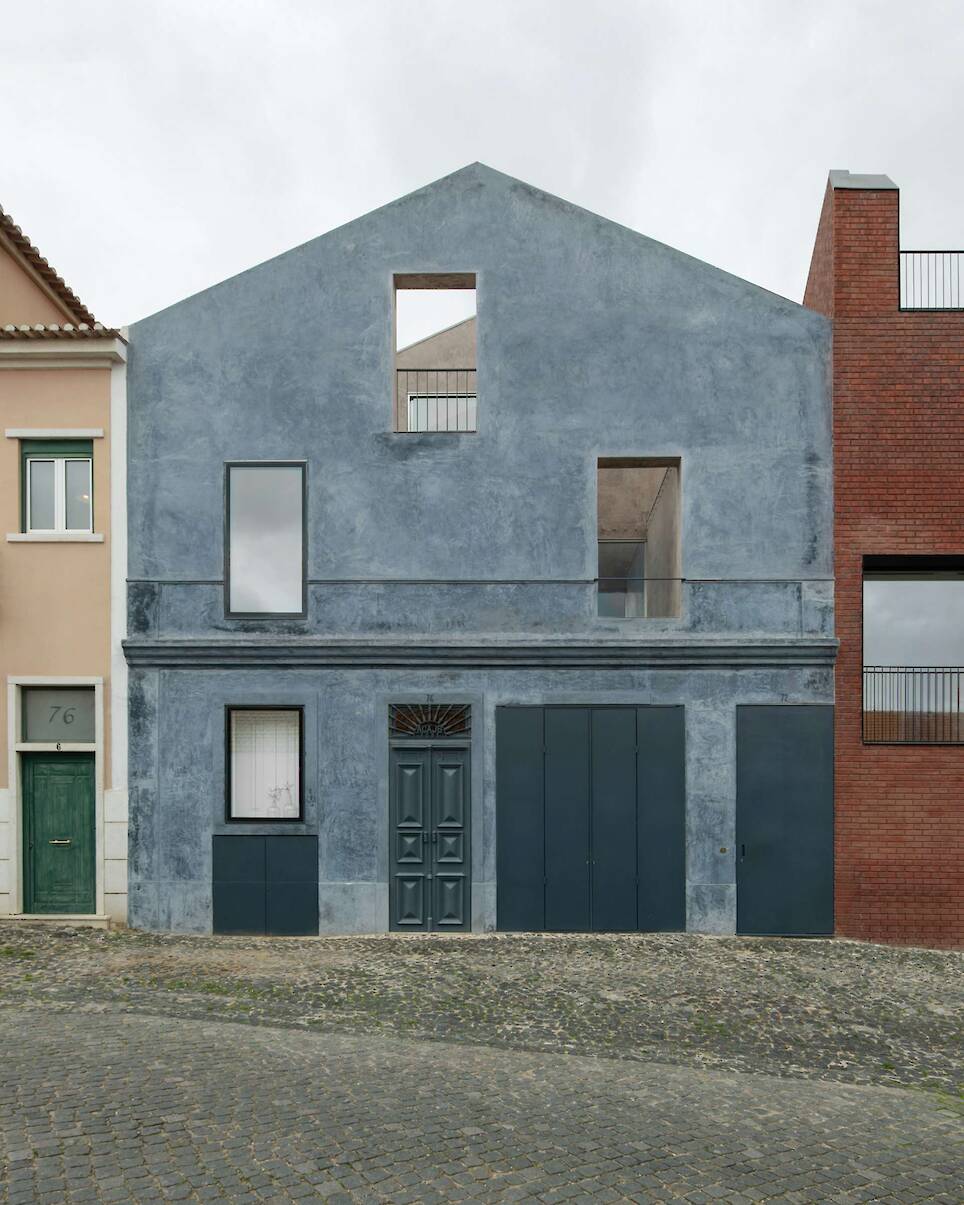 Burnished Aluminum Sheeting Covers the Entire Ground Floor of This Renovated 1893 Lisbon Home