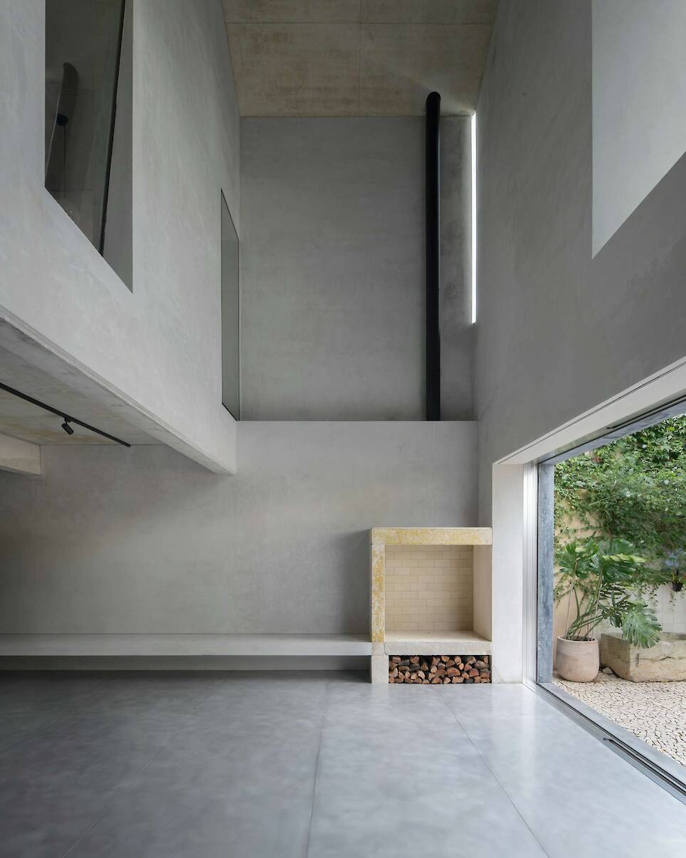 Burnished Aluminum Sheeting Covers the Entire Ground Floor of This Renovated 1893 Lisbon Home