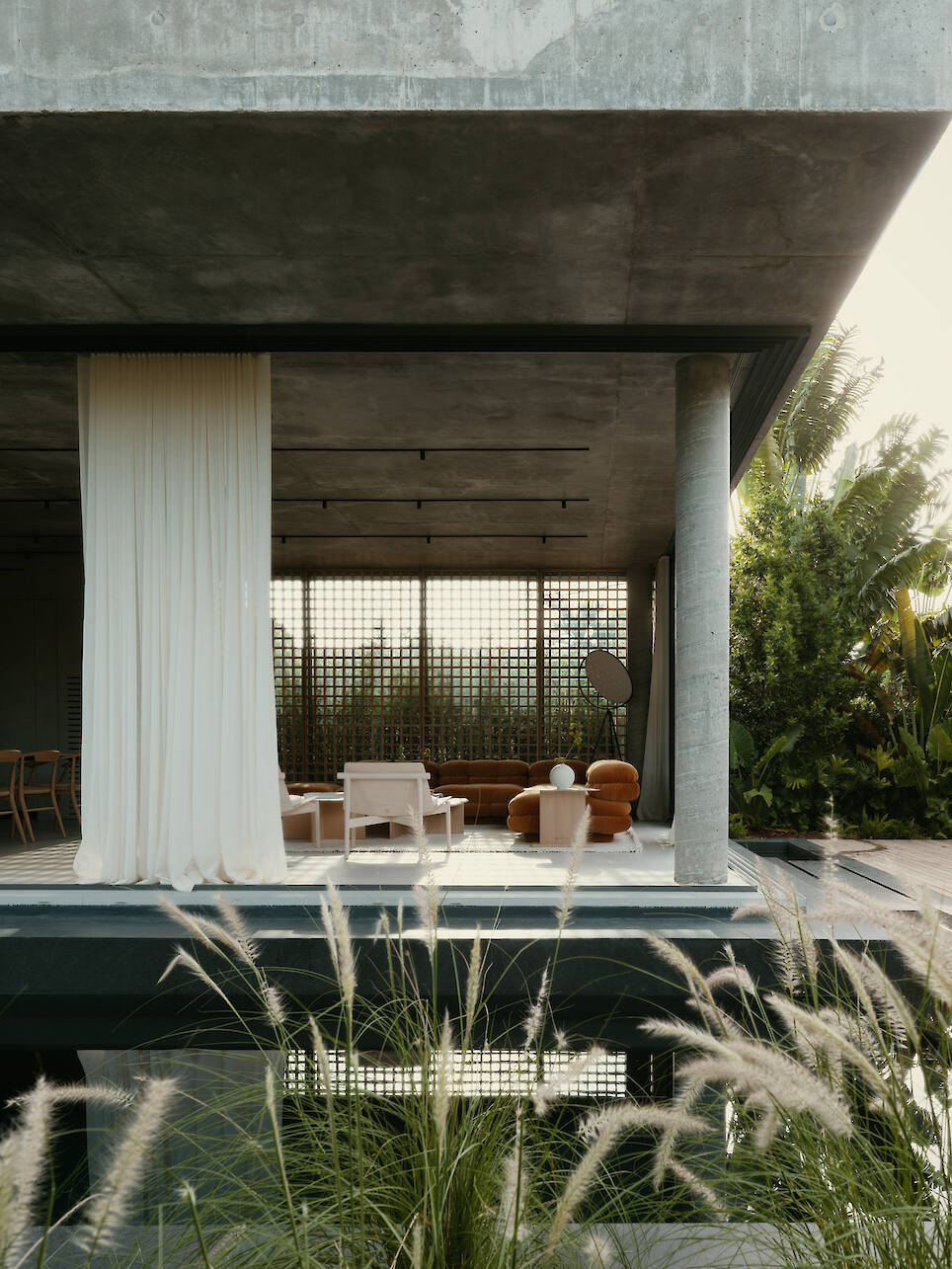 Miami house by studiokp2, a minimalist concrete building with clean surfaces and monumental volumes