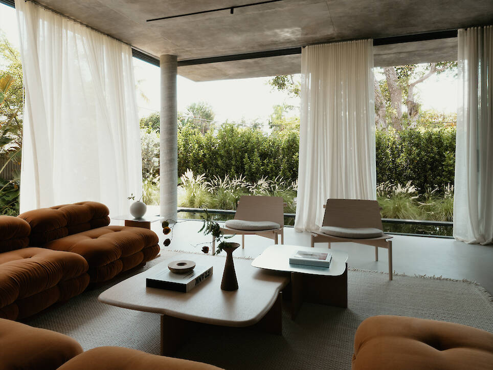 Miami house by studiokp2, a minimalist concrete building with clean surfaces and monumental volumes