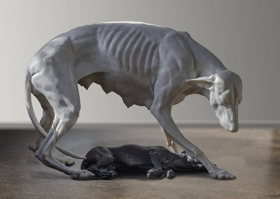 John O’Reilly, “Intertwined” (2012), white: resin graphite; black: resin porcelain and bone powder, 24 x 21 1/2 x 31 1/2 inches (white dog), 5 x 21 1/4 x 16 1/4 inches (bl
