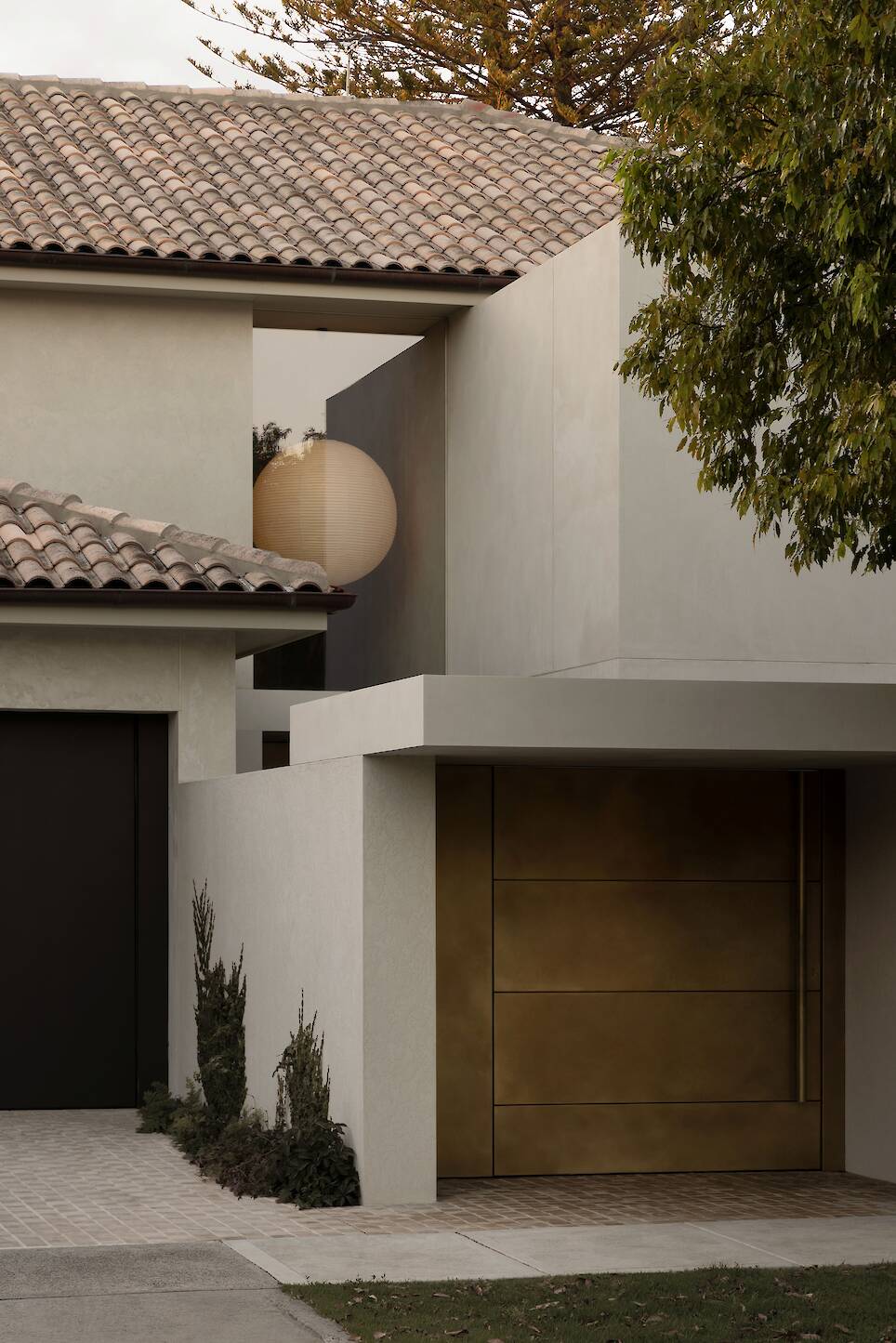 Front of white rendered home