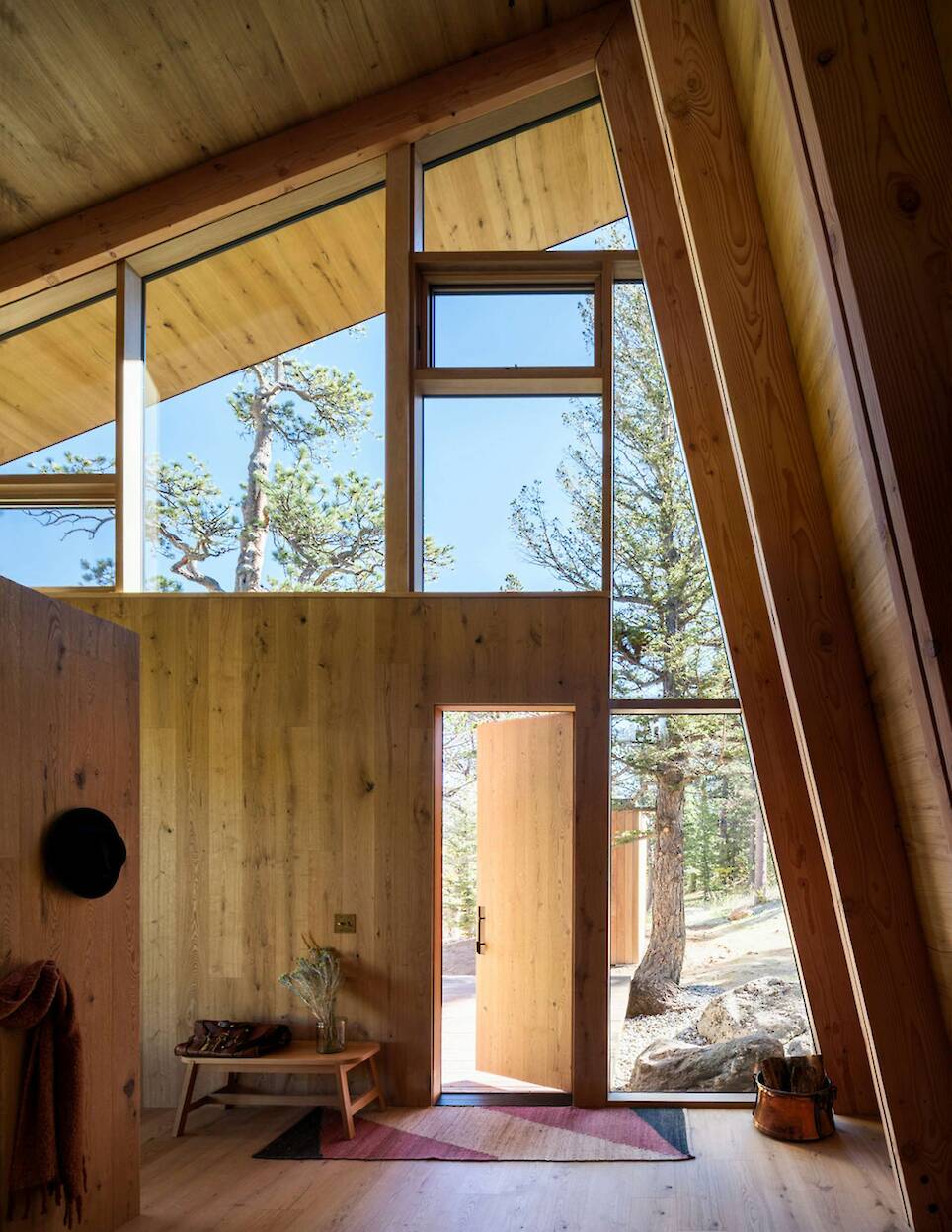 The Roof Also Forms a Wall at This Soaring Colorado Cabin - Photo 8 of 17 -