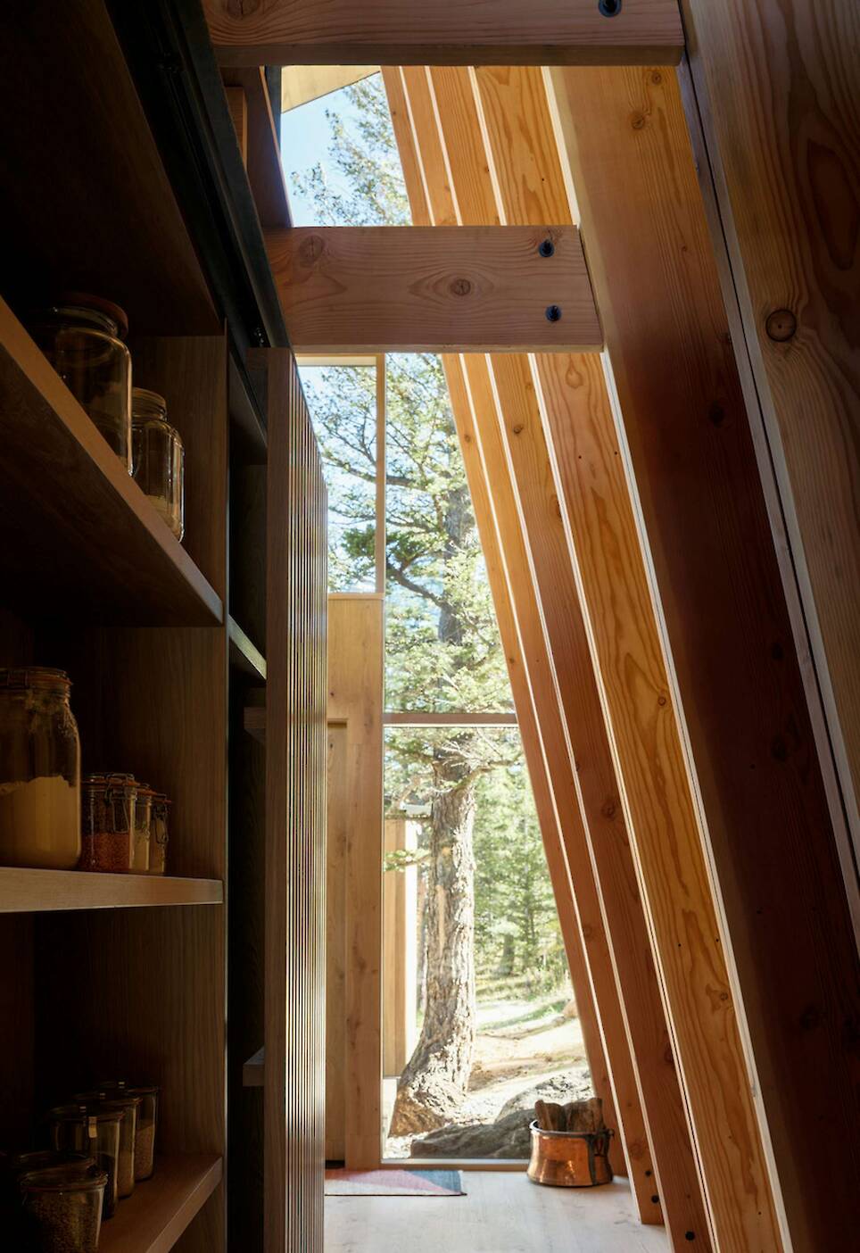 The Roof Also Forms a Wall at This Soaring Colorado Cabin - Photo 7 of 17 -