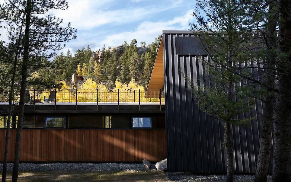 The Roof Also Forms a Wall at This Soaring Colorado Cabin - Photo 1 of 17 -