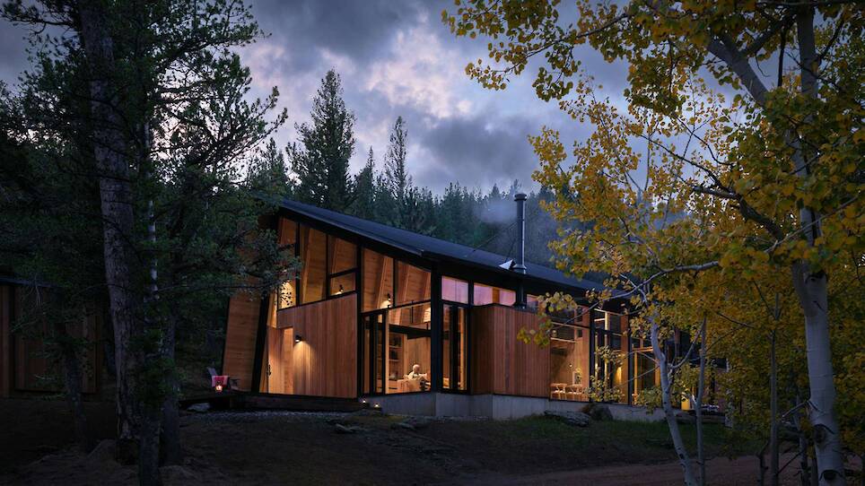 The Roof Also Forms a Wall at This Soaring Colorado Cabin - Photo 4 of 17 -