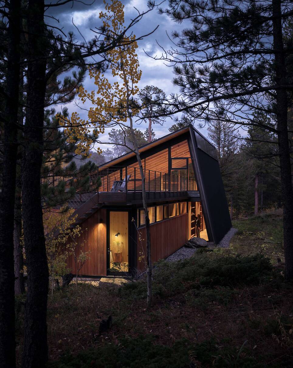 The Roof Also Forms a Wall at This Soaring Colorado Cabin - Photo 3 of 17 -