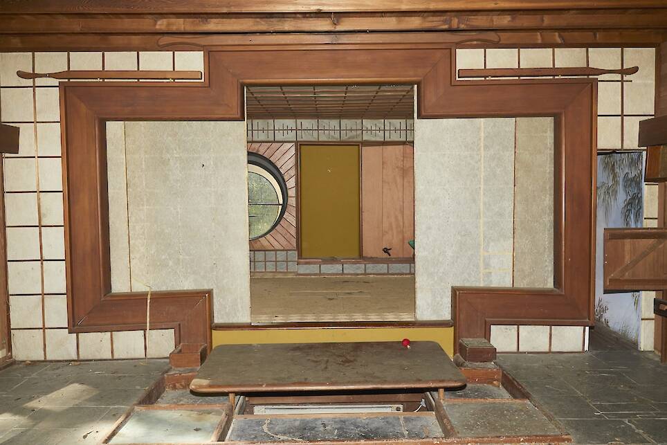 the interior of a hand-built home in Northern California from the 1970s with Japanese details