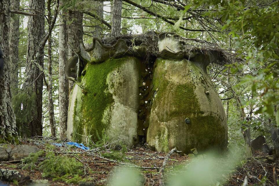 a hand-built home reminiscent of a neolithic tomb