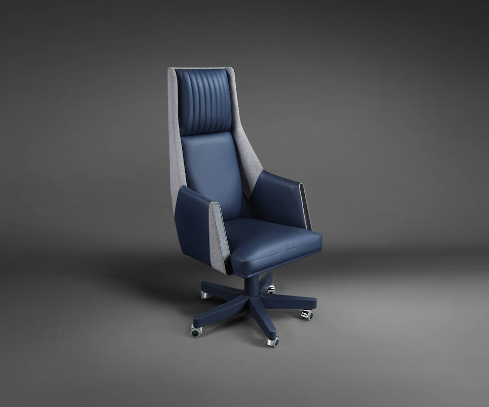 Modern swivel office chair with a high back, navy blue leather upholstery, grey fabric sides, and a five-wheel base, set against a plain dark background