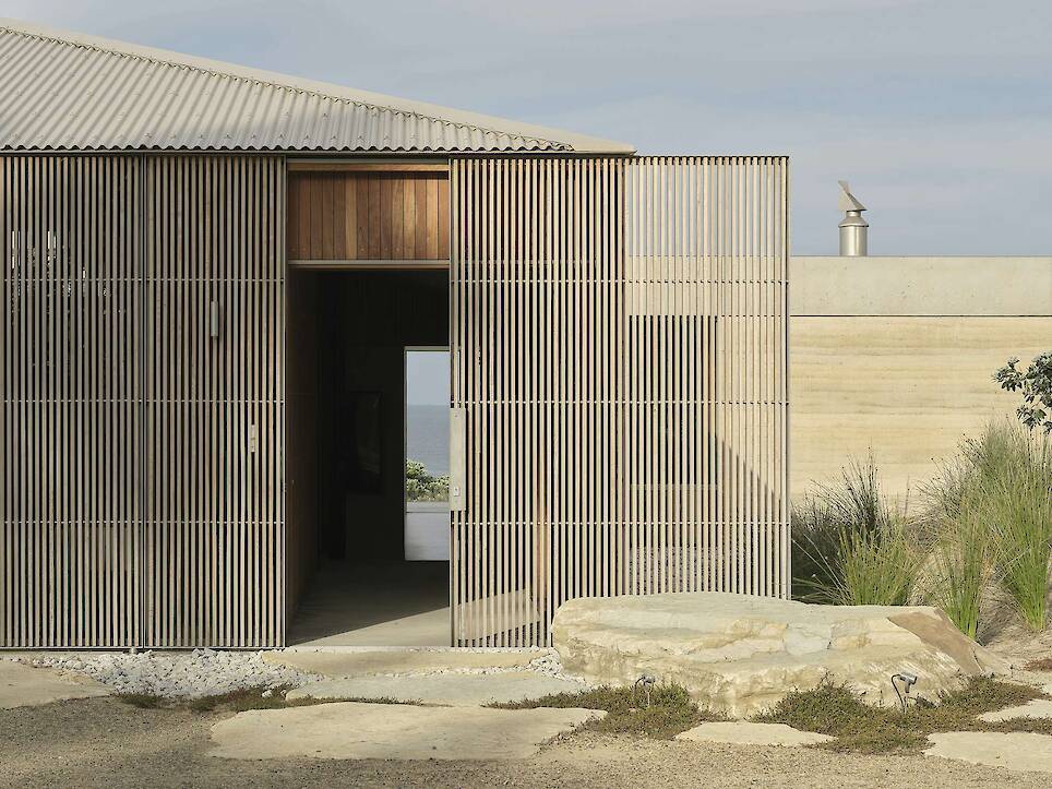 Floor-to-Ceiling Glass Sliders Peel Back Entire Walls at This Rammed Earth Home in New Zealand - Photo 5 of 18 -