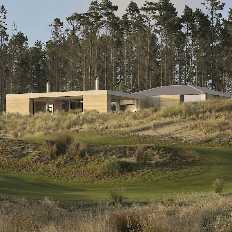 Floor-To-Ceiling Glass Sliders Peel Back Entire Walls at This Rammed Earth Home in New Zealand